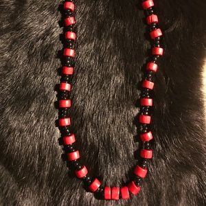 Red Wood beaded with black seed beads